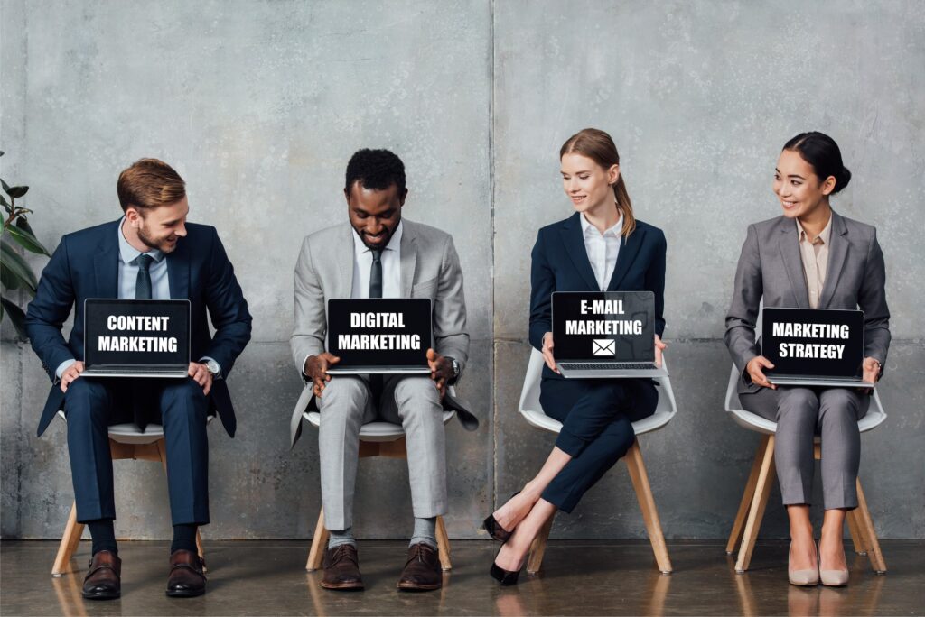 four people looking at each others screens