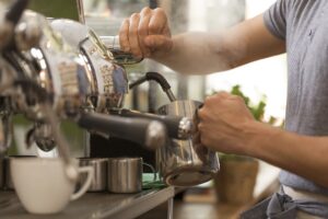 a barista making coffee